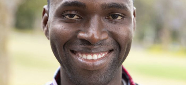 Smiling man looking into the camera. Foto: Camilla Zilo